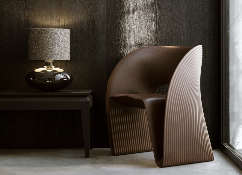 Stunning table lamp on a table by a modern armchair