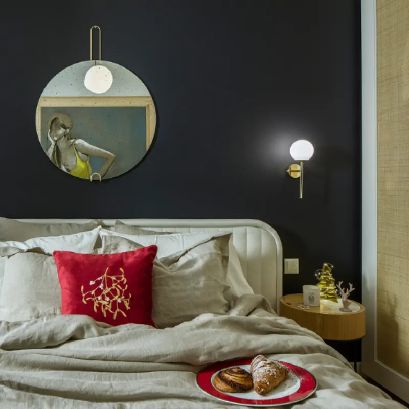 Christmas bedroom with atmospheric wall lamp Astra