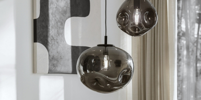 black pendant lamps with curved lampshades